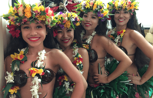 hawaiian hula dancers in traditional costumes