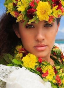 hawaiian woman wearing lei on head